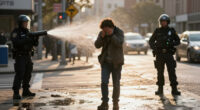 Police blast water cannons at protesters amid unrest over stabbing in Belfast